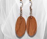 Timeless Elegance: Oval Red Oak Wood Earrings – Handcrafted Artistry for a Distinctive and Nature-Inspired Statement.