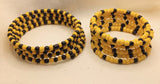 black and yellow seed bead wire wrap parent and child bracelets side by side
