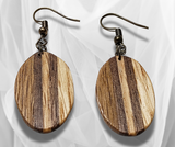 Elevate Your Style: Oval Inlay Wood Earrings – Handcrafted Artistry for a Timeless and Unique Statement. Elevate Your Style: Oval Inlay Wood Earrings – Handcrafted Artistry for a Timeless and Unique Statement.